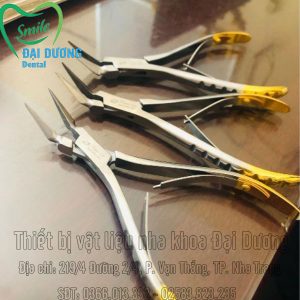 Kềm nhổ chân răng cán vàng